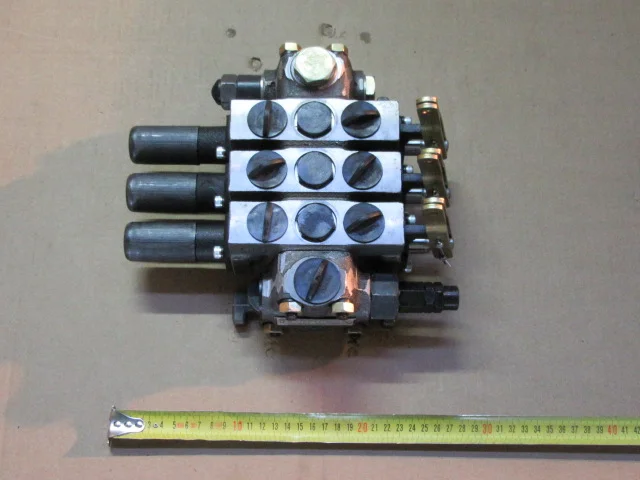 Гидрораспределитель мтз 1221 нового образца